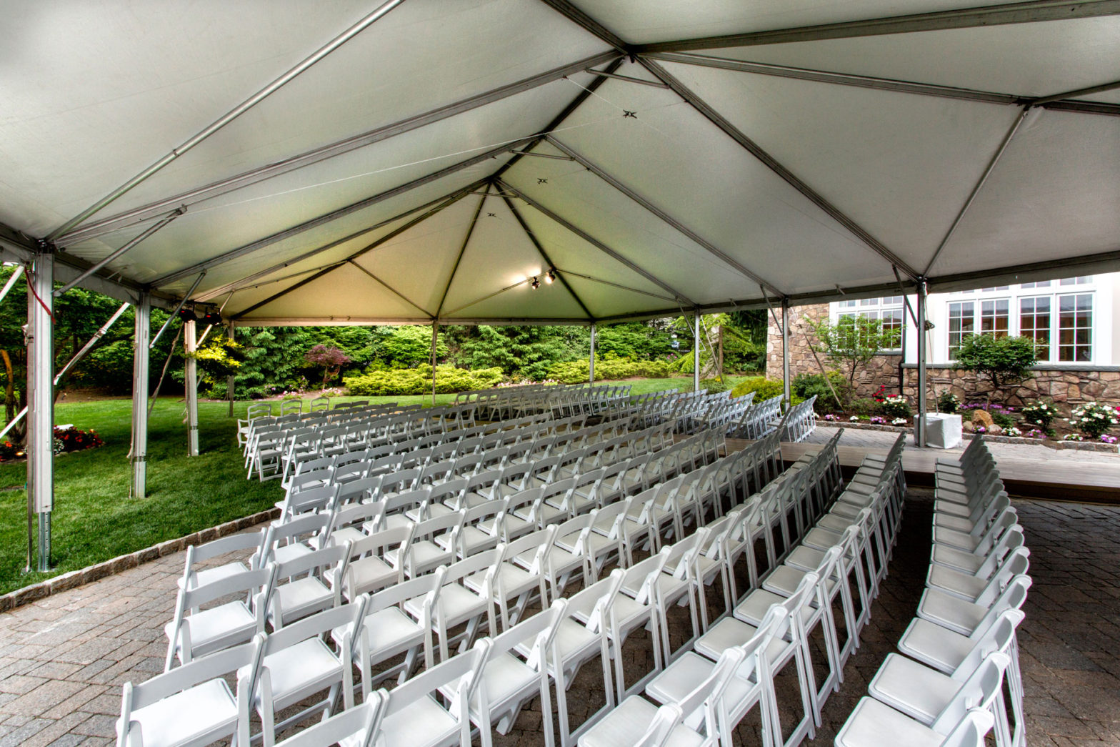 white chairs setup for wedding ceremony