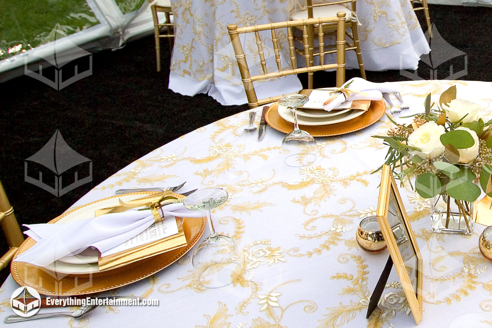 white linen with decorative gold linen overlay